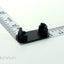 End cap for 1/2" x 1-1/8" Oval Aluminum Extrusion with ruler for dimension