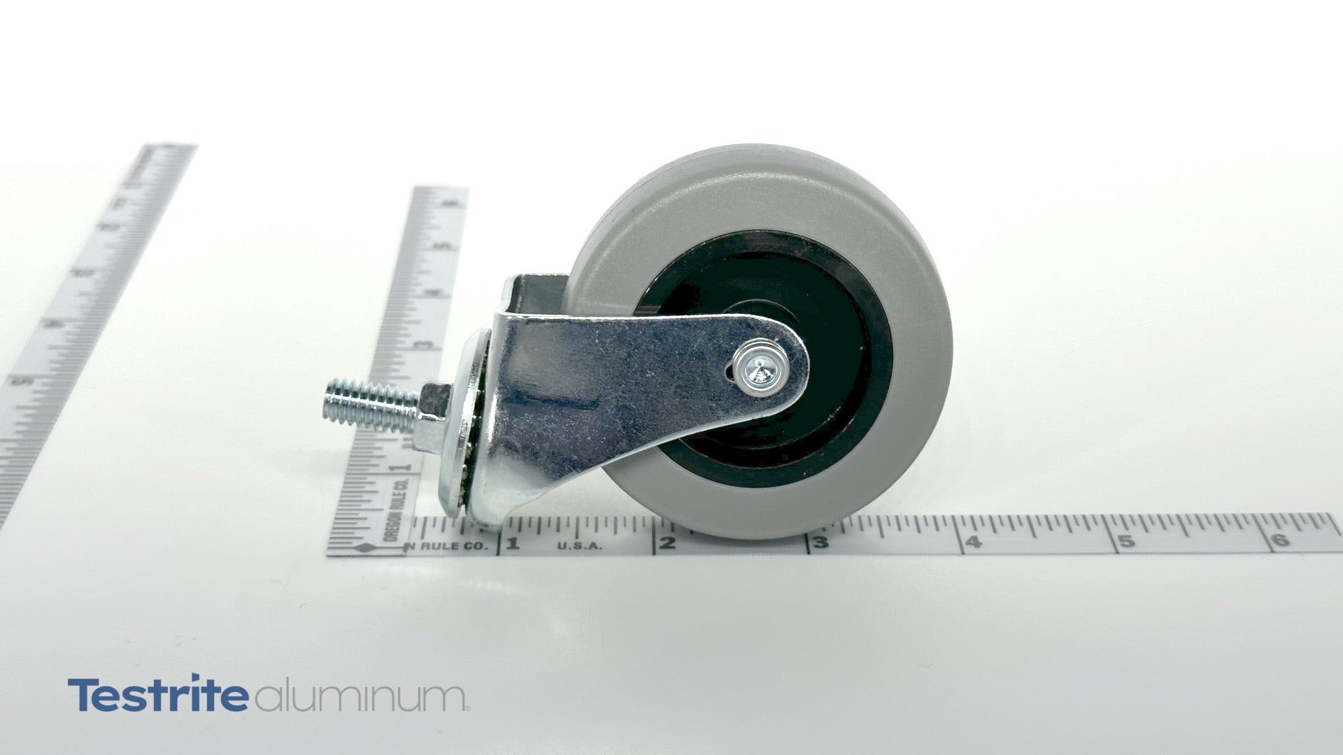Scaled swivel ball bearing caster