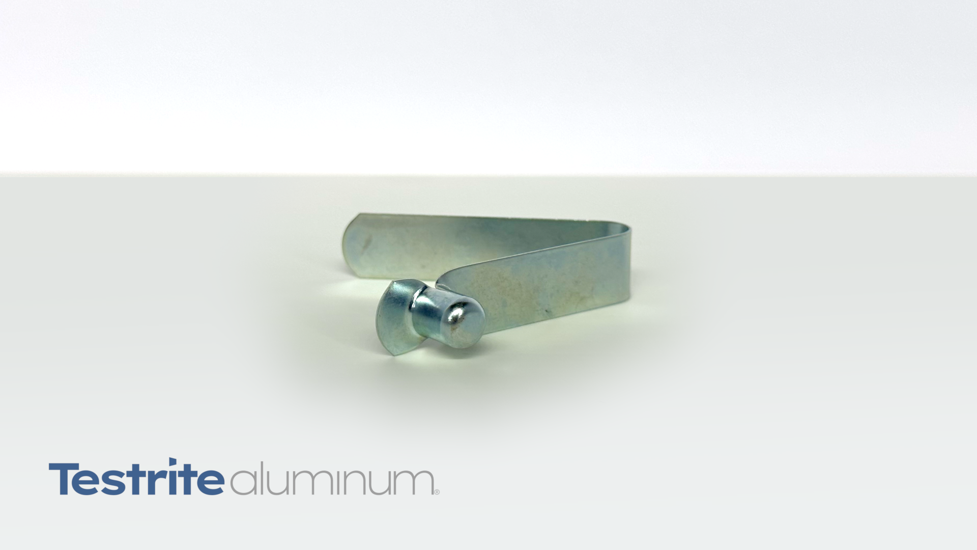 T140 Steel Spring Button for 3/4" OD 7/8" OD 1' OD 1-1/8" OD and 1-1/4" OD Tubing 0.75", 0.875", 1 inch, 1.125" OD 1.25" OD Tubing with 0.3" 5/16" diameter head x .038" or 3/8" high head, zinc plated steel straight leg angled view